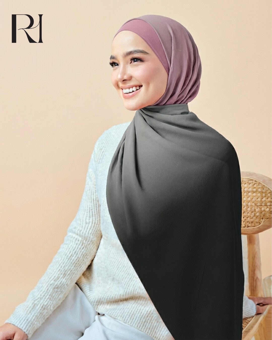 Woman wearing a hijab with a visible brand logo on a beige background