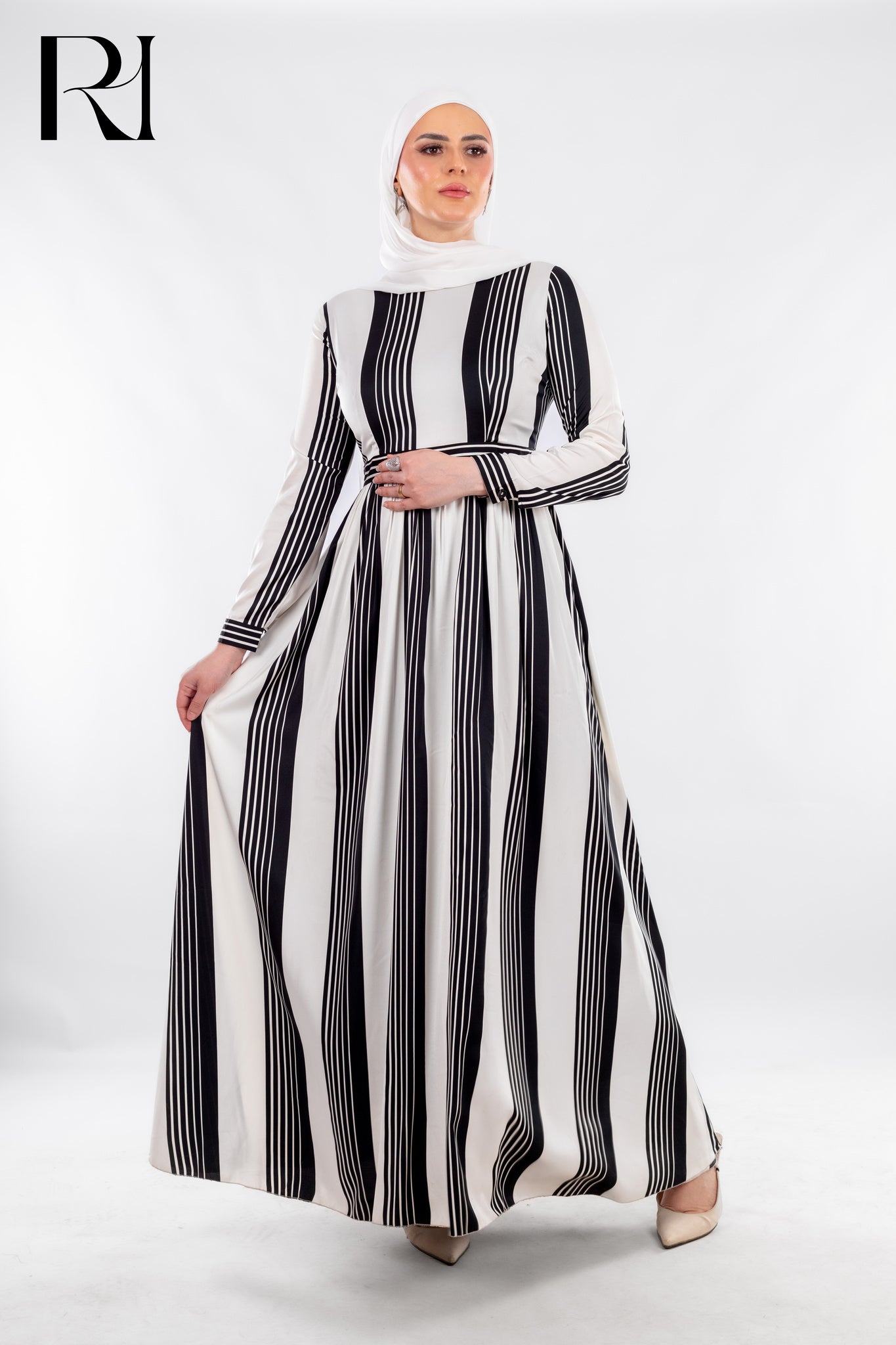 Striped Black & White Modest Maxi Dress with Sleek Poise - Ruehaya