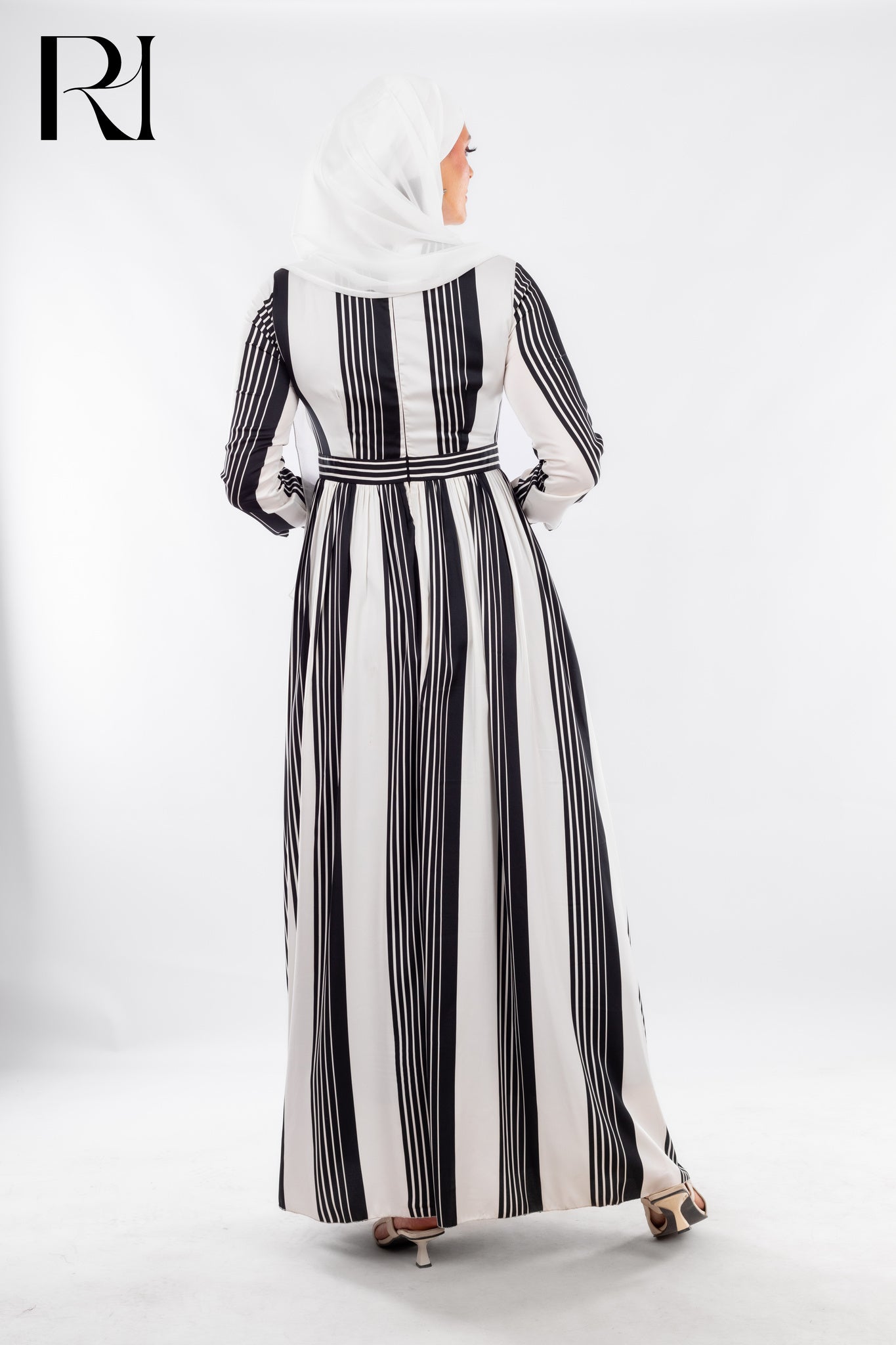 Striped Black & White Modest Maxi Dress with Sleek Poise - Ruehaya