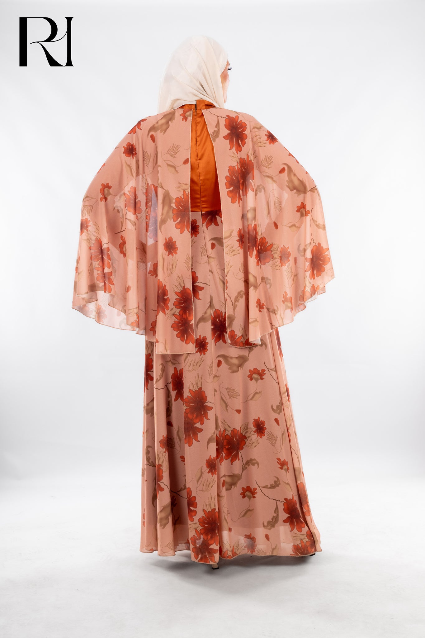 Flow Freely in Floral: Modest Orange Maxi Dress with a Twist - Ruehaya