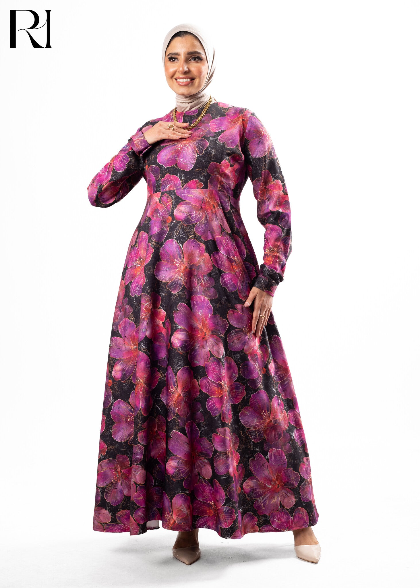 Woman wearing a floral dress with a hijab on a white background