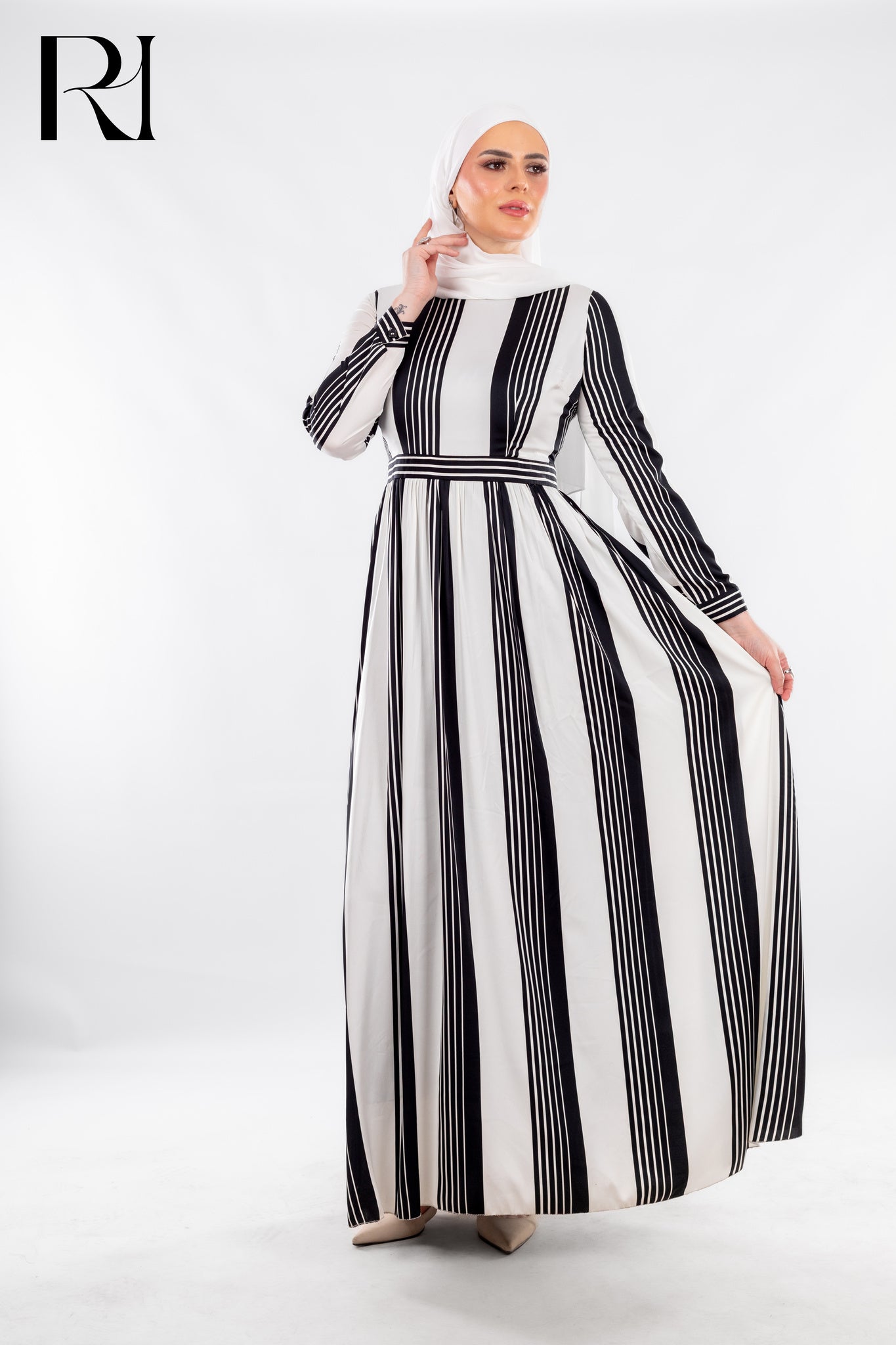 Striped Black & White Modest Maxi Dress with Sleek Poise - Ruehaya